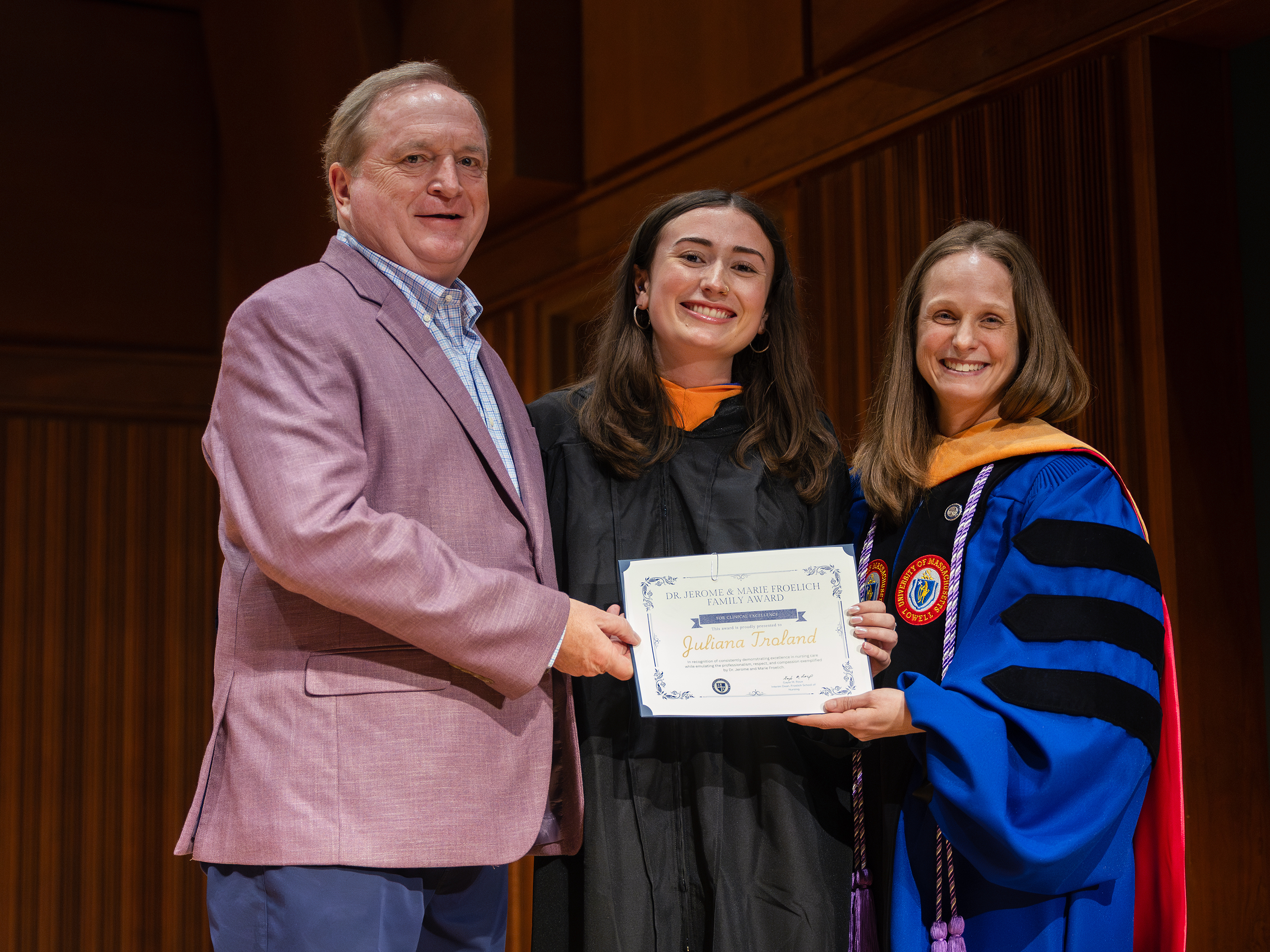 Juliana Troland recevies an award at nursing pinning.